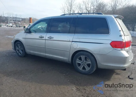 2009 Honda Odyssey Touring z USA, uszkodzony, nr VIN 5FNRL38939B008918